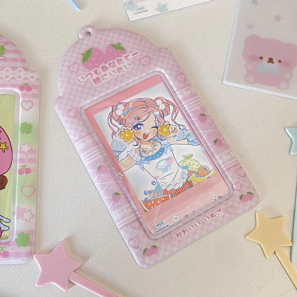 Plaid strawberry PVC card holder pendant measuring 7.6cm by 13.6cm