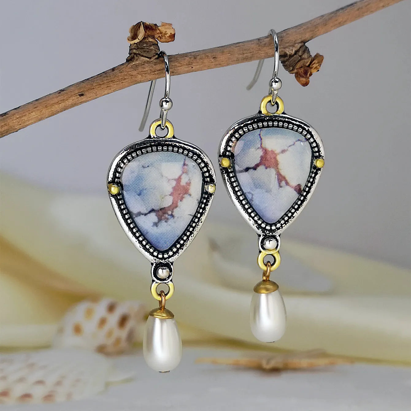 Retro blue drop earrings with geometric design and synthetic opal pearl details