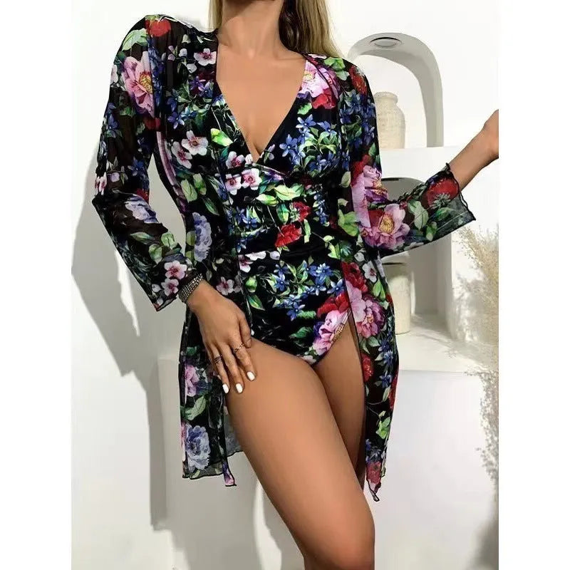 Women's floral patterned bikini and matching coat swimwear set in one of seven available colours.