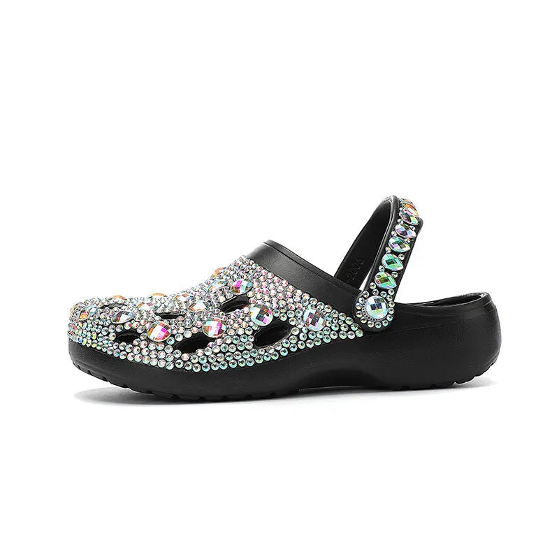 Black women's platform sandals with rhinestone decoration and a holey EVA upper.