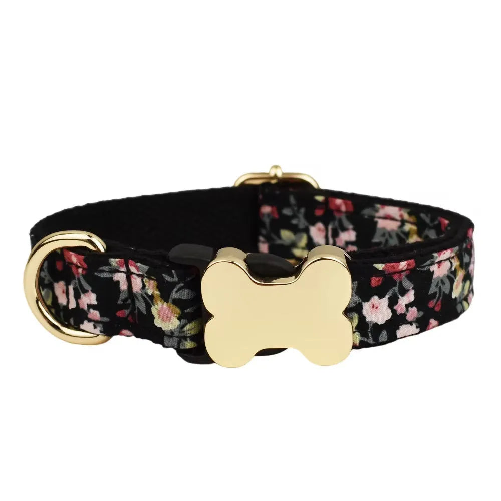 Flat nylon dog collar with printed grid pattern and a white bone-shaped buckle on a red background.