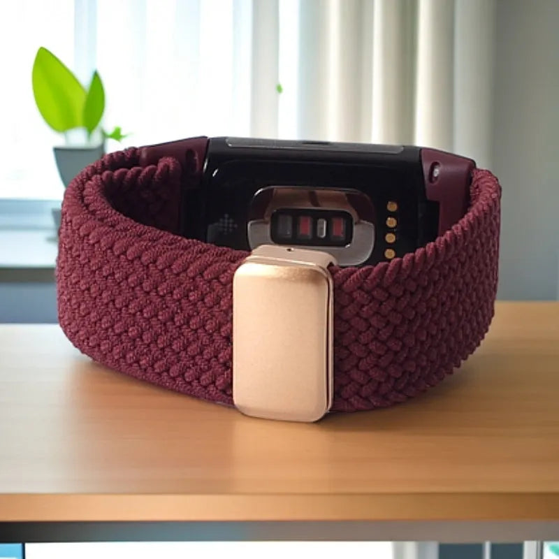 Woven elastic magnetic watch band in black for Fitbit Charge 5 with metal magnetic buckle and nylon strap