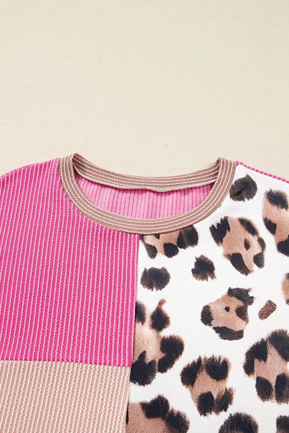 Women's round-neck ribbed colour-block leopard print long-sleeve top in rose red, front view