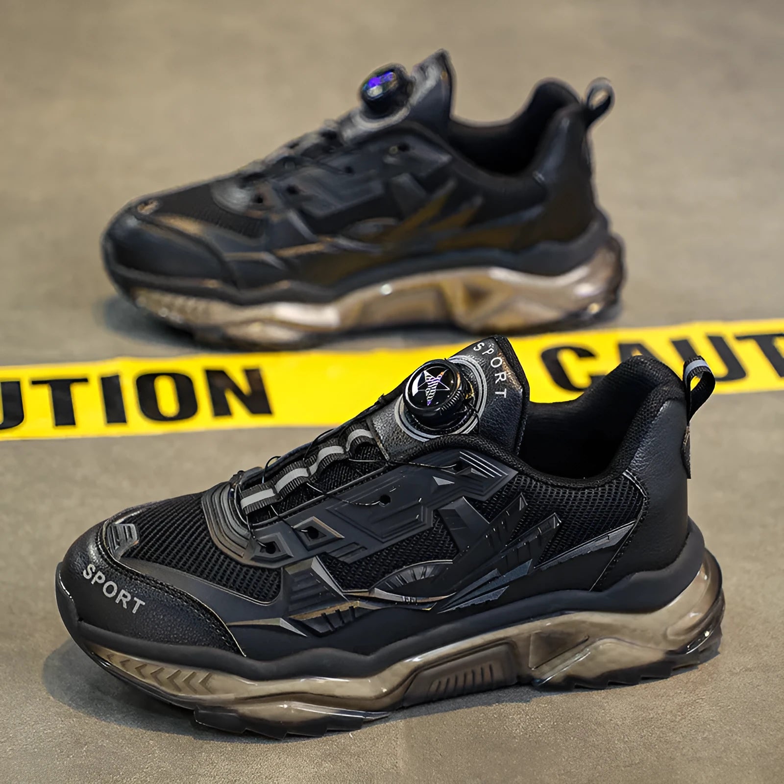 Men's black rotating button dad shoes with mesh upper and platform sole on a white background