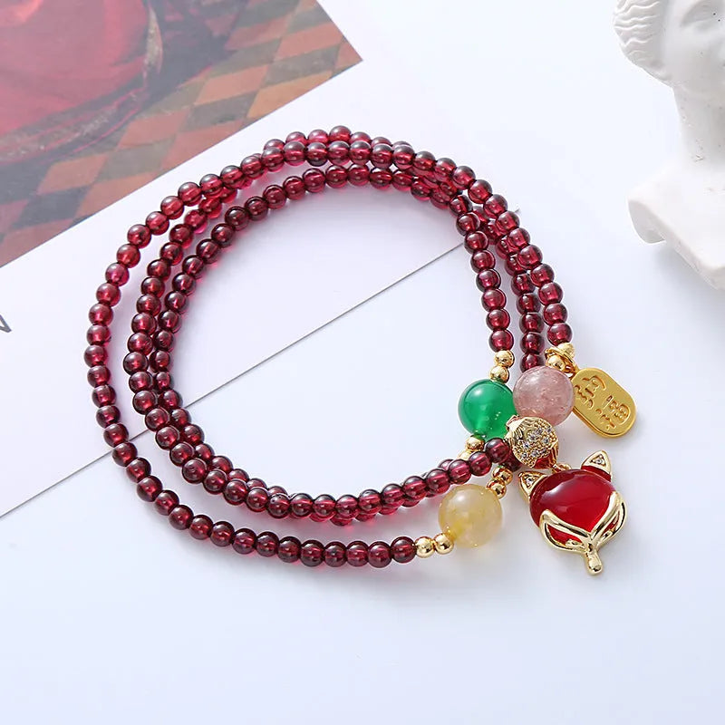 Purplish red garnet fox bracelet with adjustable rope tie for women