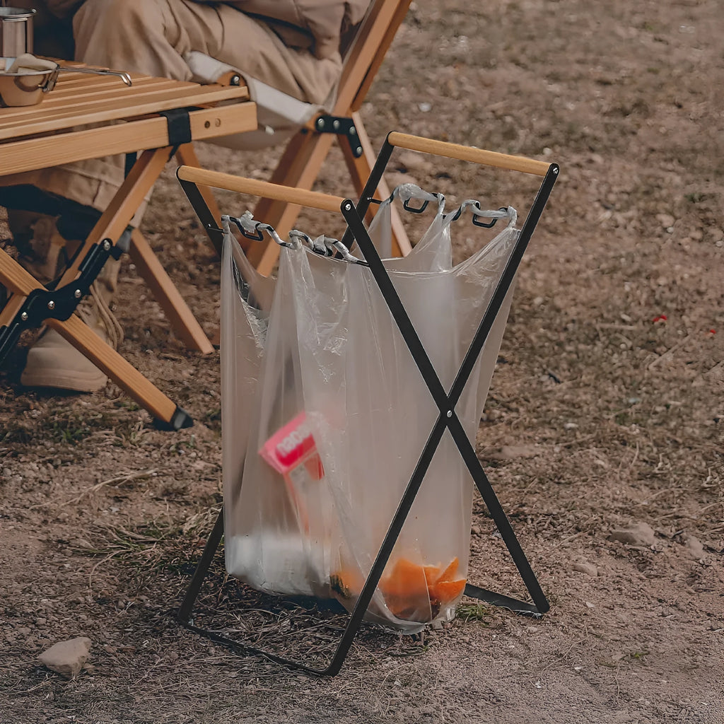 Outdoor iron garbage storage hanger with wooden handle in folded position
