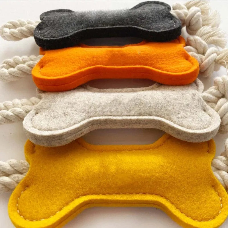 Durable bone-shaped dog rope chew toy with felt cover in four colour options