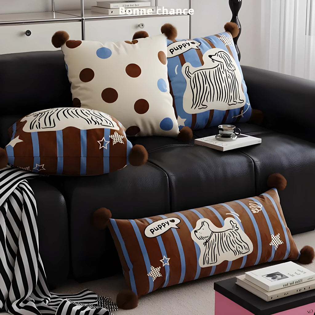 Blue cartoon animal printed cushion on a grey sofa, showing removable cotton canvas cover and 45x45cm size.