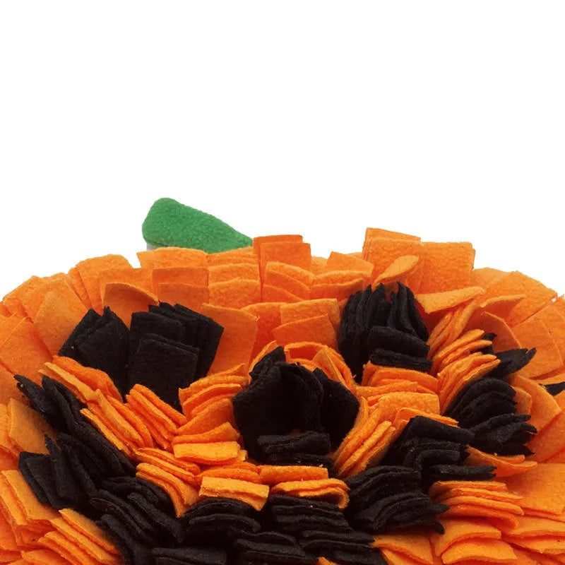 Orange pumpkin-shaped dog sniffing mat with furry fabric texture for slow feeding