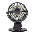 USB rechargeable clip fan with battery options in multiple colours attached to a surface