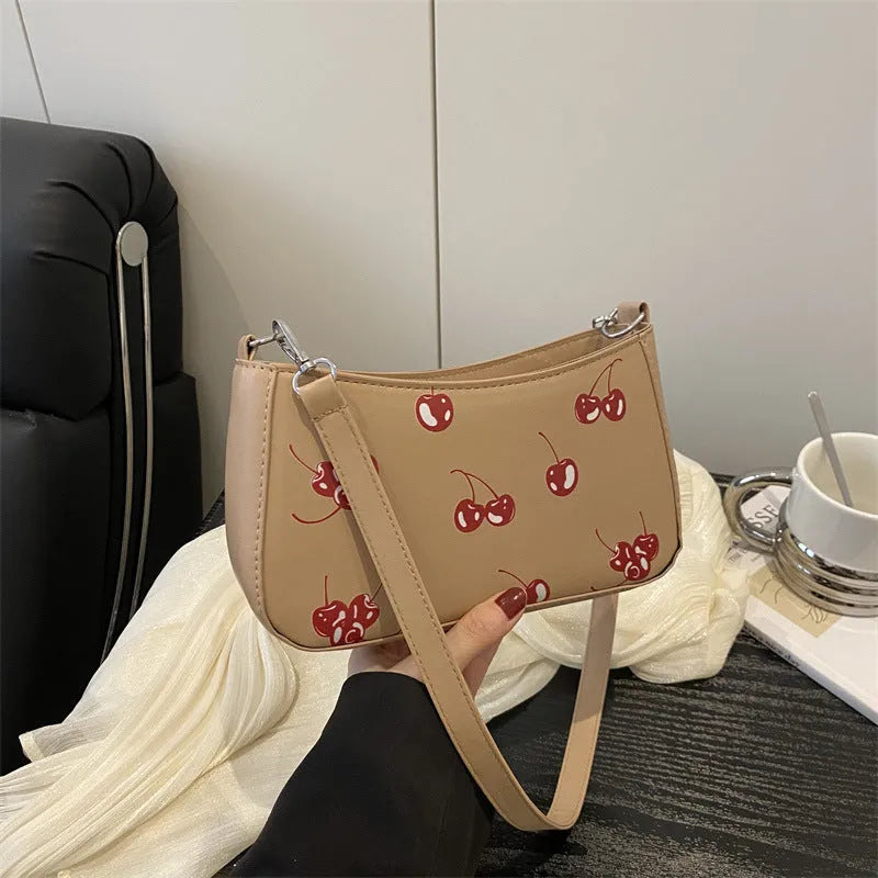 Casual PU underarm crossbody bag with floral print in black colour showing three-dimensional outer pocket