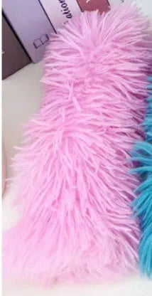 Green, white, blue, and pink plush cat toy pillow measuring 27cm by 10cm