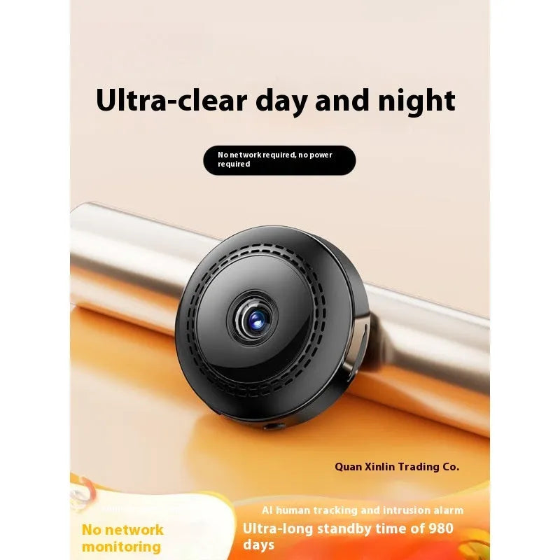 Wireless security camera with 360-degree rotation on a black stand showing HD night vision capability