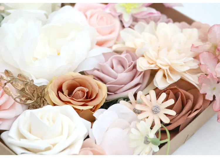 Silk flower bouquet in Lotus Pink Champagne Rose gift box with half-handmade arrangement on white background.