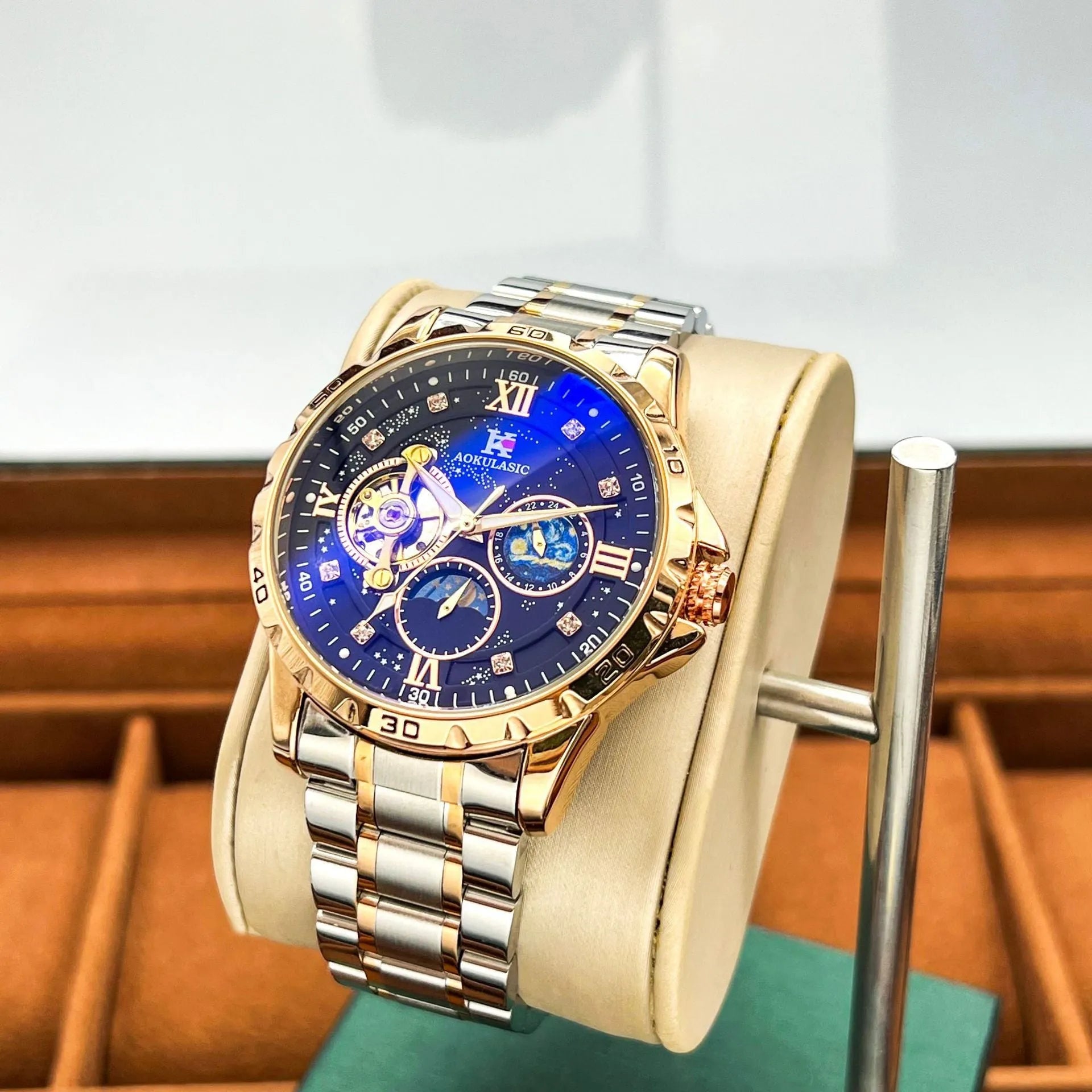 Automatic mechanical men's watch with rose gold shell, black surface, and large multifunctional dial