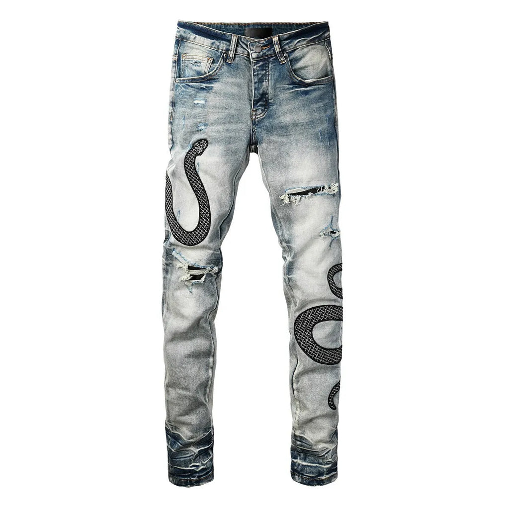 Men's distressed blue skinny jeans with a retro wash, shown with a button fly and a tight leg fit.