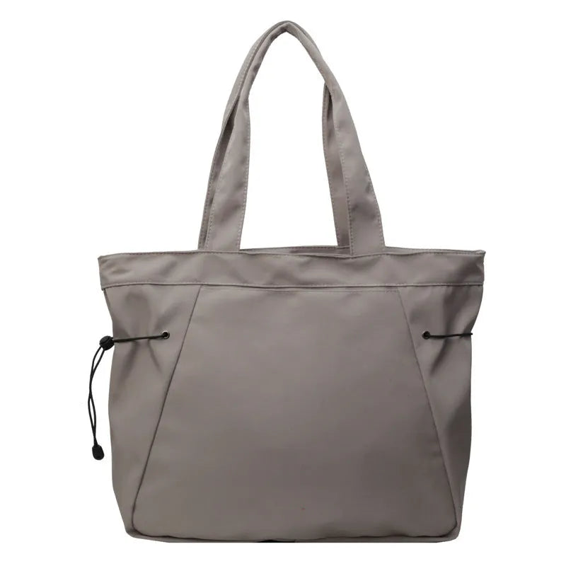 Soft Oxford cloth commuter shoulder tote bag in multiple colours with folding street trend design