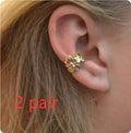 Gold starfish and scallop shell design women's earrings with electroplated finish