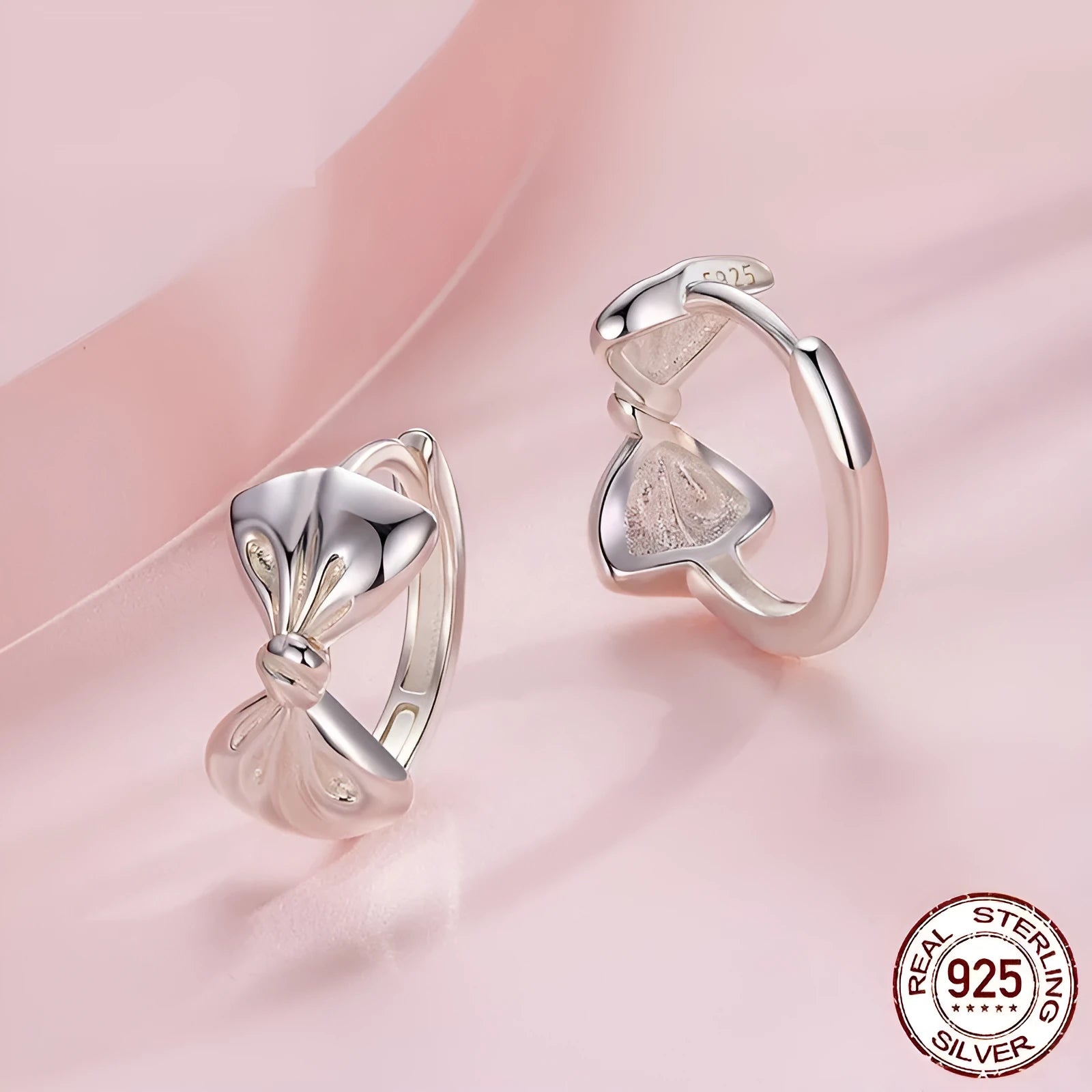 Pair of 925 silver bow earrings with electroplated finish in BSE1196 colour