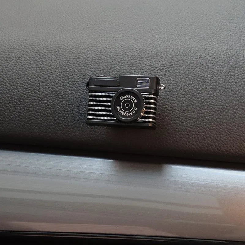 Set of four retro camera dot design plastic adhesive hooks for car interior, each measuring 4.2cm by 2.5cm.