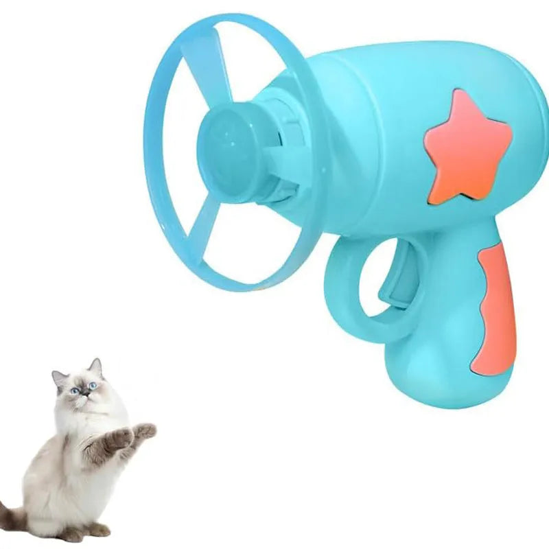 Blue interactive cat toy gun with plastic Frisbee mounted on launch mechanism