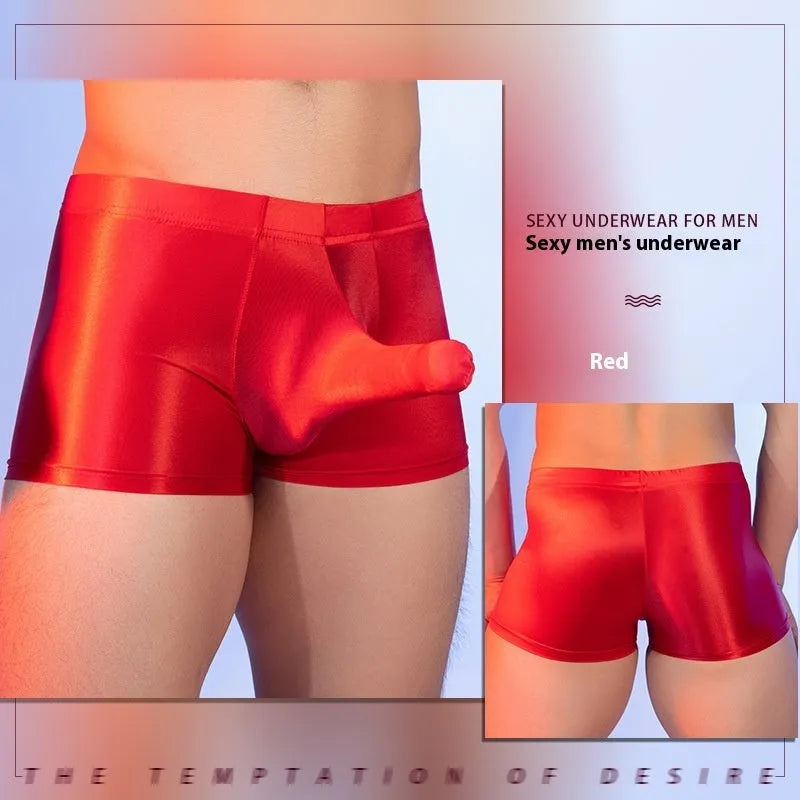 Men's red boxer shorts with an elephant nose design, made from breathable nylon fabric.