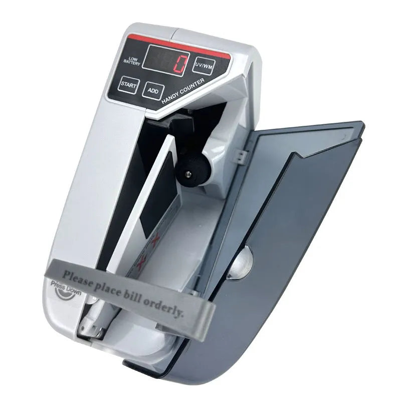 V31 foreign currency counting machine with purple light detector and LED display on a desk