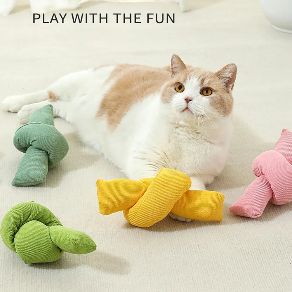 White cotton dog rope toy with multiple knots for tug play and chewing