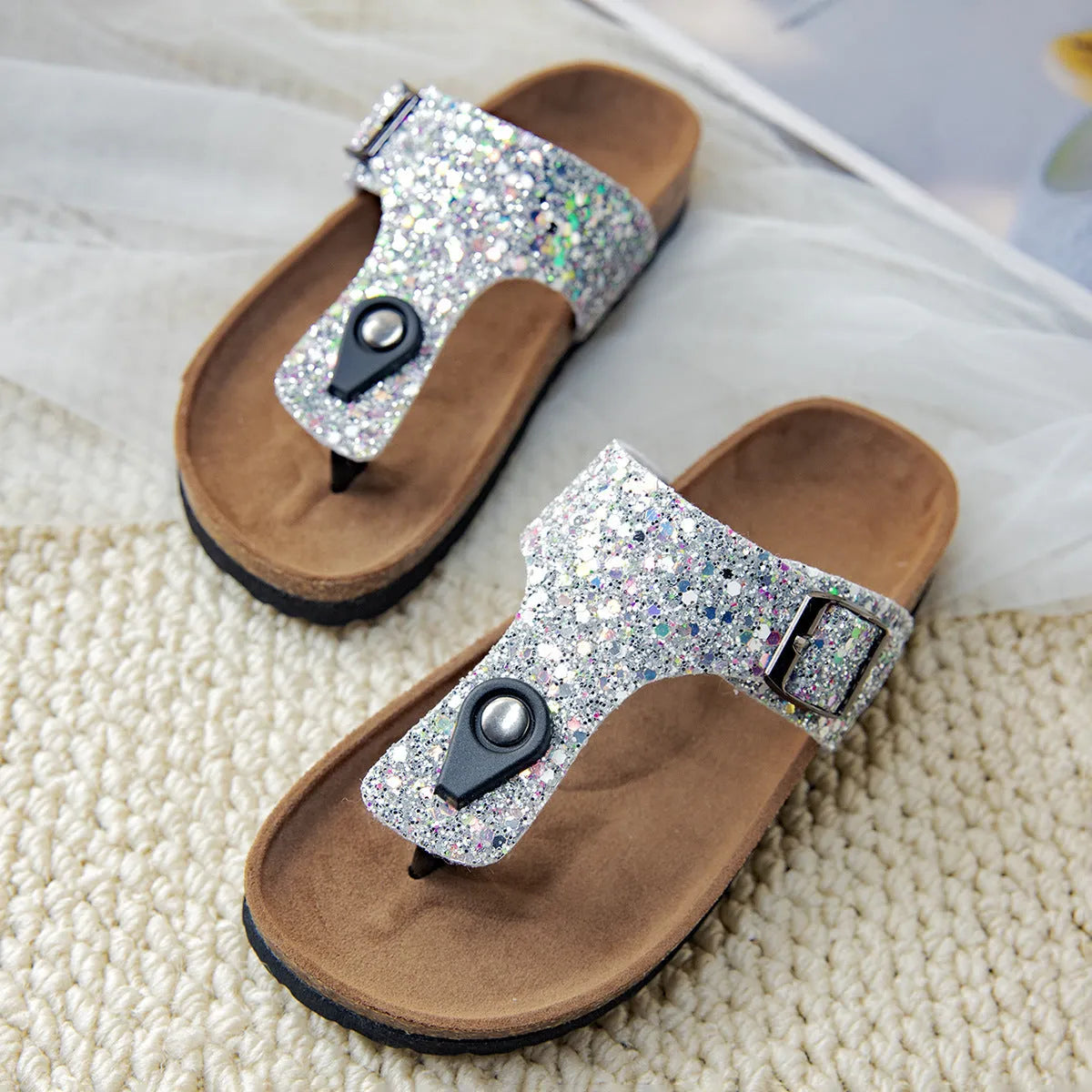 Gold, pink, or silver cork flip-flops with PVC sole and frosted artificial leather upper