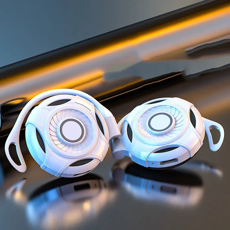Black Bluetooth gaming earphones with hanging ear design and USB charging cable