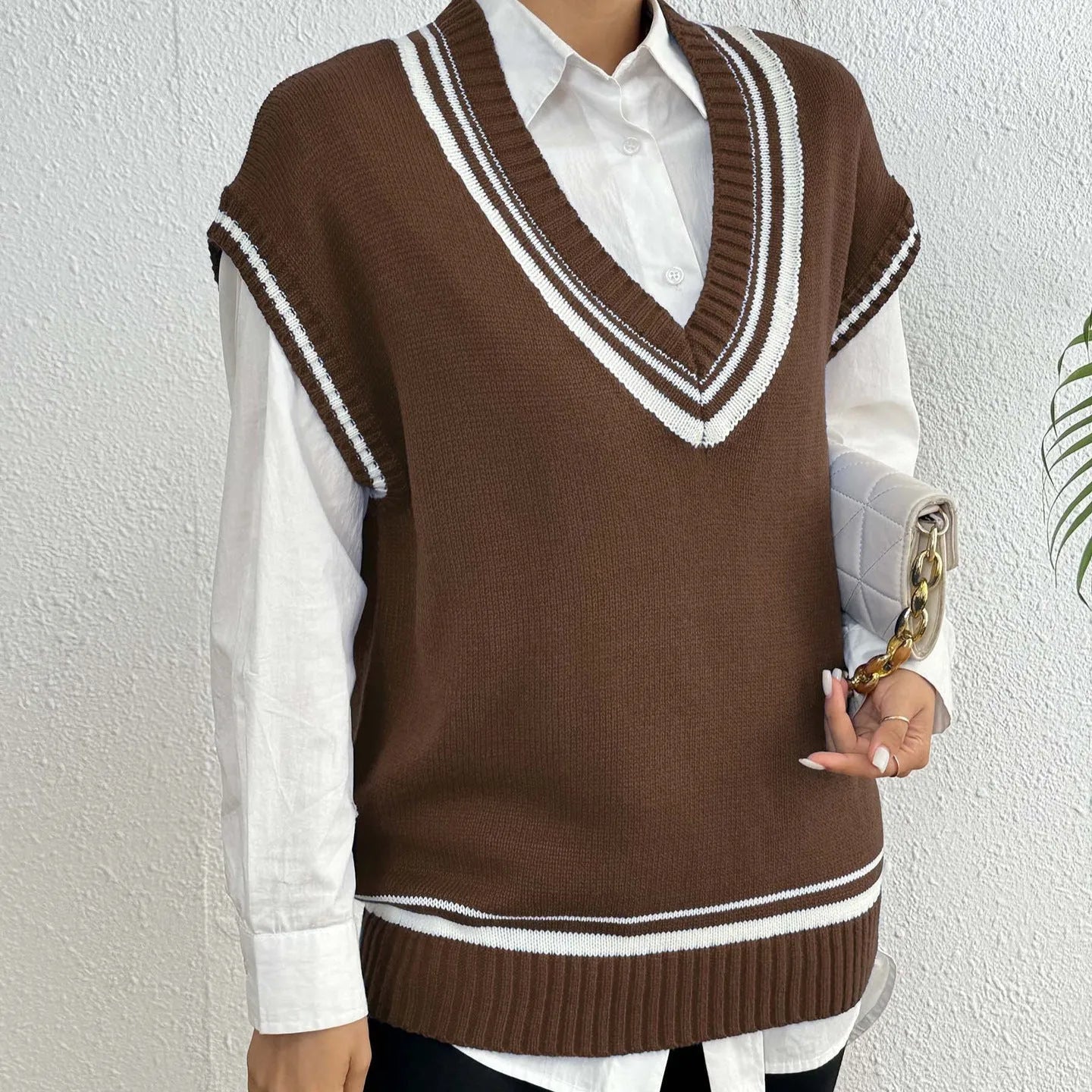 Women's casual vest sweater in wool blend fabric with loose fit and college style design
