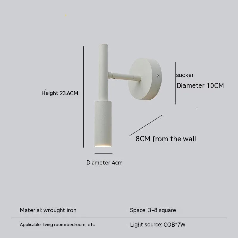 Modern wrought iron wall lamp in black or white finish, showing three colour light options.