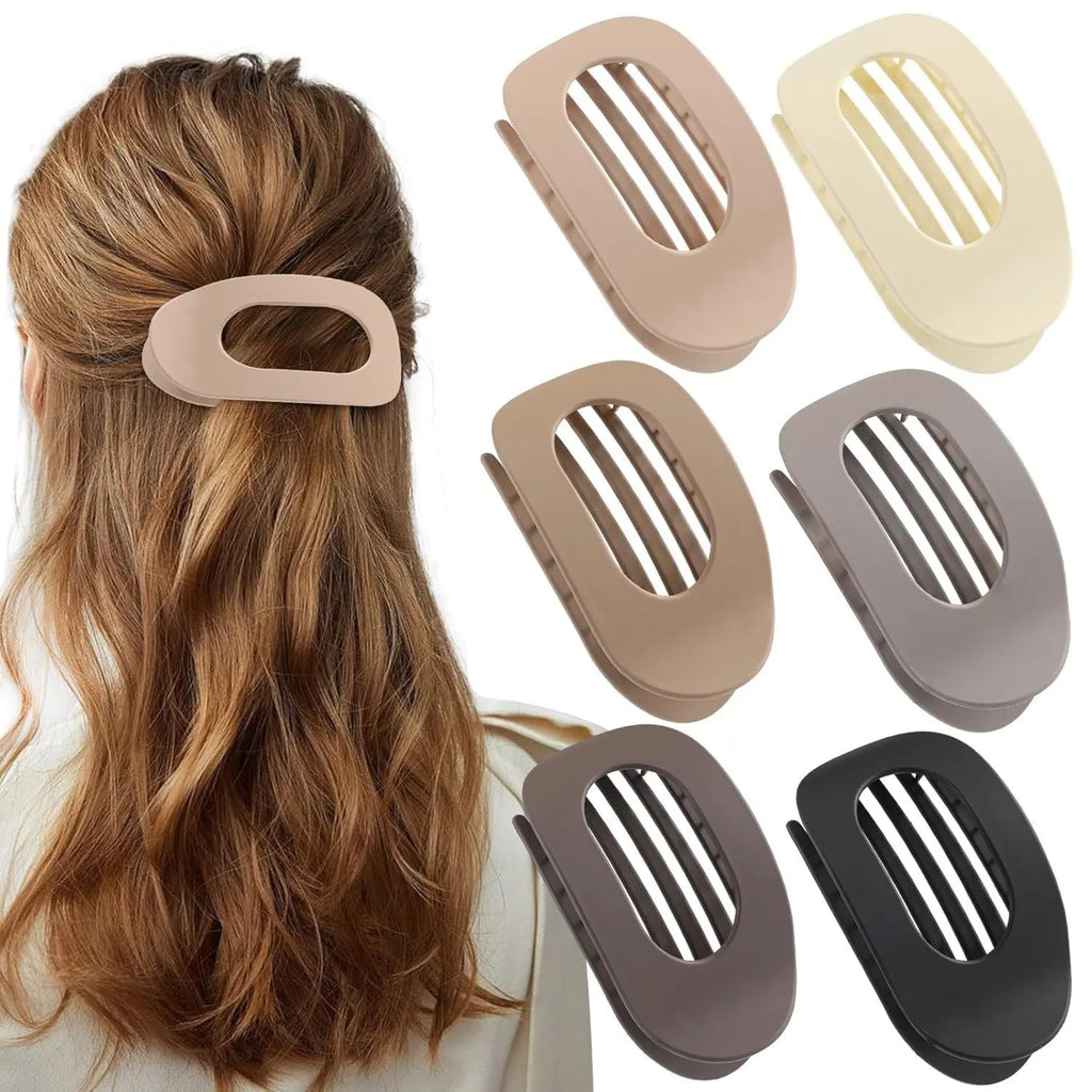 Six rose red plastic hair clips with quadrilateral shape and frosted surface on white background