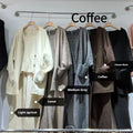 Women's light brown knit cardigan and suspender pants three-piece casual set on a hanger.