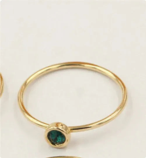 14K gold gilded brass knuckle ring with zircon stones in green blue dark red white colours