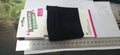Black wrist bag armband sleeve for mobile phone, shown on an arm, dimensions 10cm by 10.5cm.