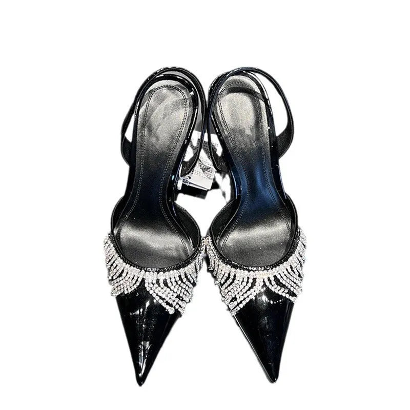 Black women's slingback high heel sandals with pointed toe, 10cm heel, and French tassel rhinestone detail.