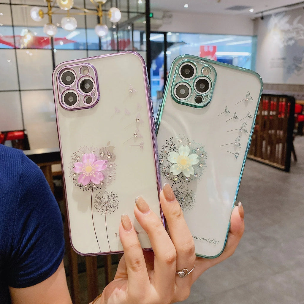 Green silicone iPhone case with a 3D spinning pink flower decoration on the back.