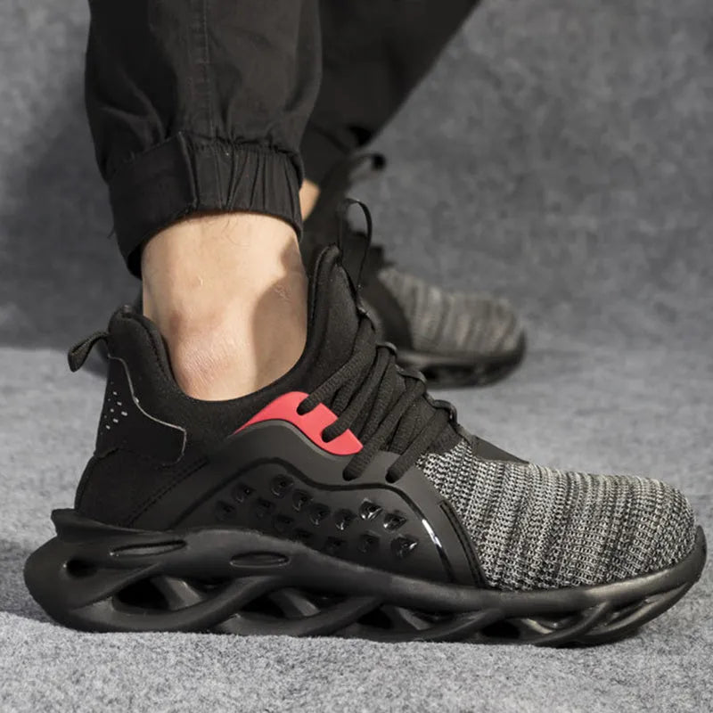 Men's anti-puncture safety sneakers with steel toe, lace up, black, breathable fly woven upper and EVA sole