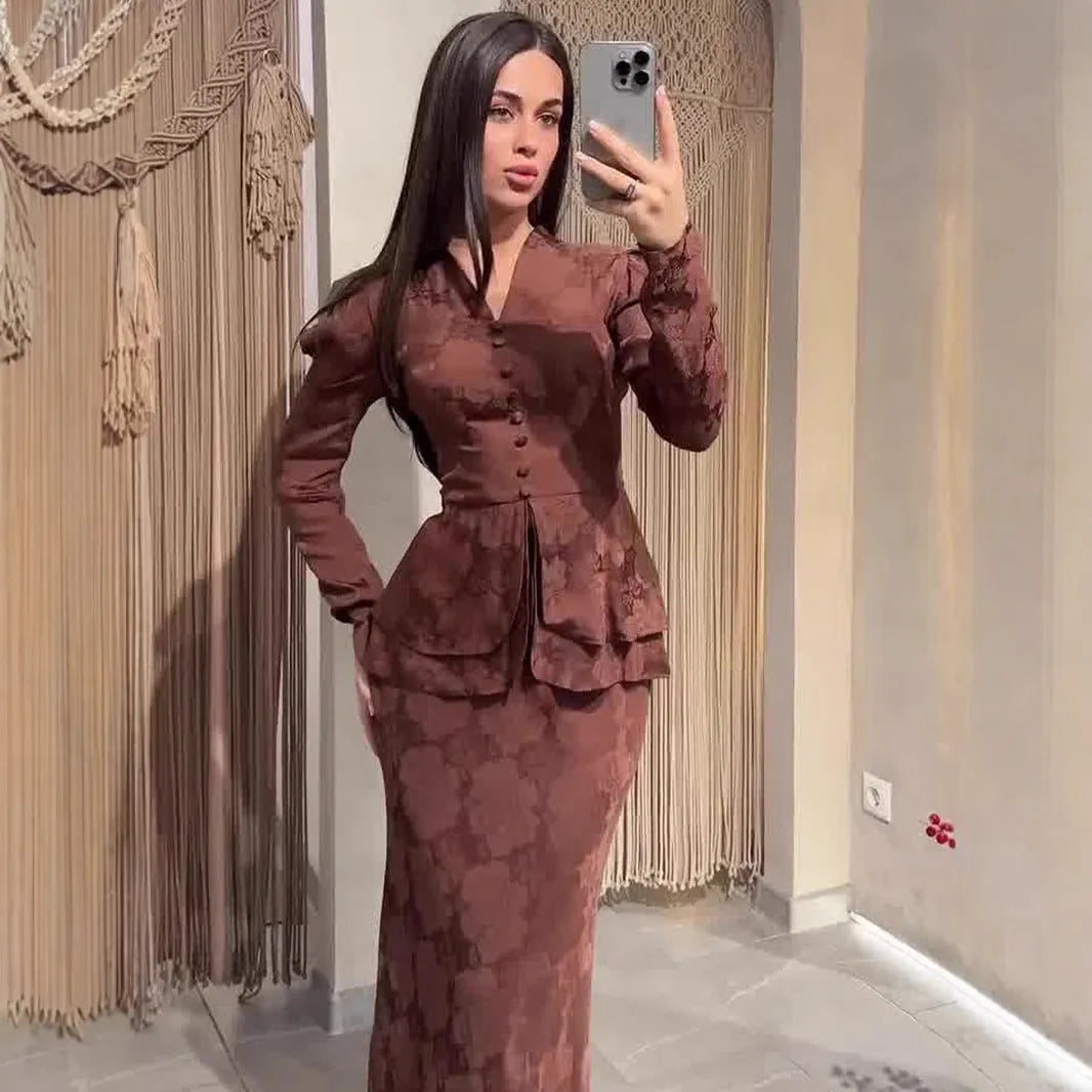 Dark brown long sleeve floral dress with button details and a fake two-piece retro design.