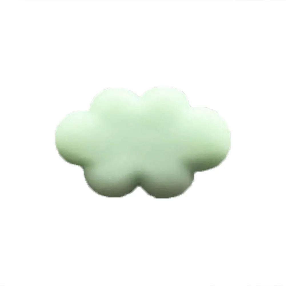 Resin cartoon Baiyun cloud car air freshener clip in light green, shown attached to a car air vent.