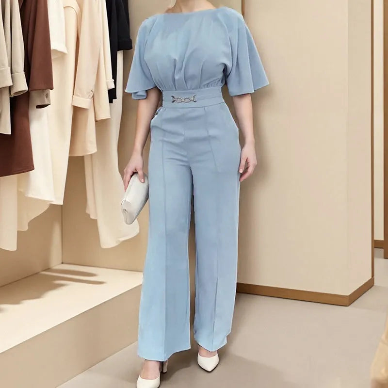 Blue men's two-piece polyester suit with jacket and trousers on a hanger