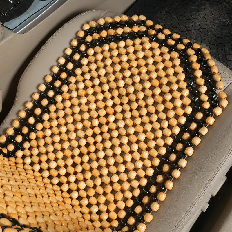 Beige and black car seat cushions with breathable mesh fabric and elastic strap fastening