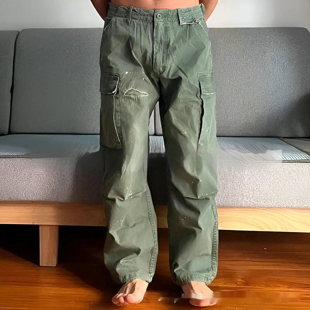 Men's loose cotton paratrooper trousers in Army Green with mid rise zipper fly