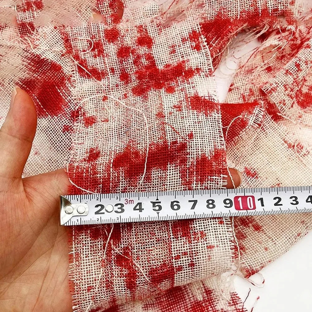A roll of Halloween horror bandage with a bloody red dye or white colour, shown with a width of 8cm.