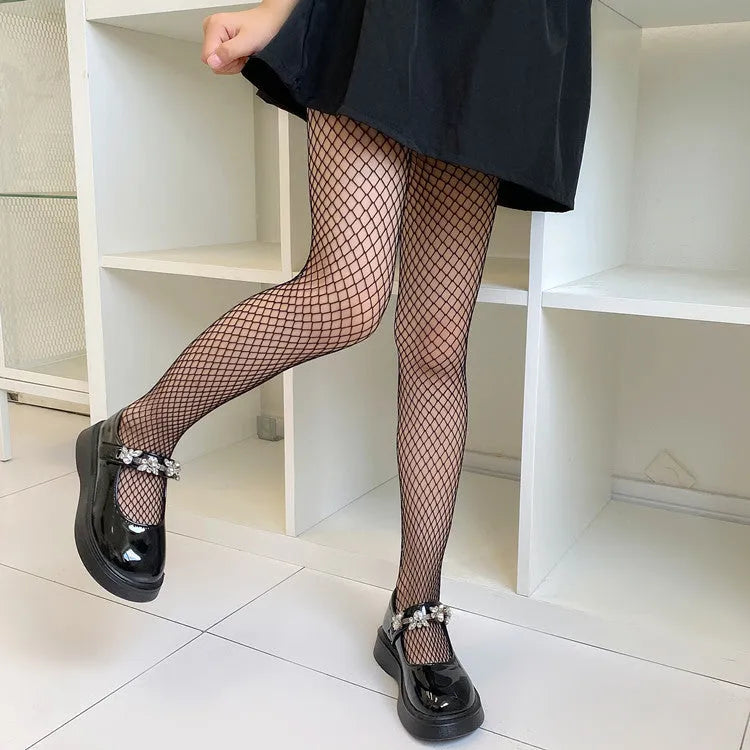 Women's mesh stockings in large, medium, and small hole patterns in black and white colours.