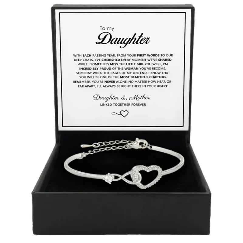 Hollow zircon loving heart opening bracelet in silver finish on copper base with electroplating