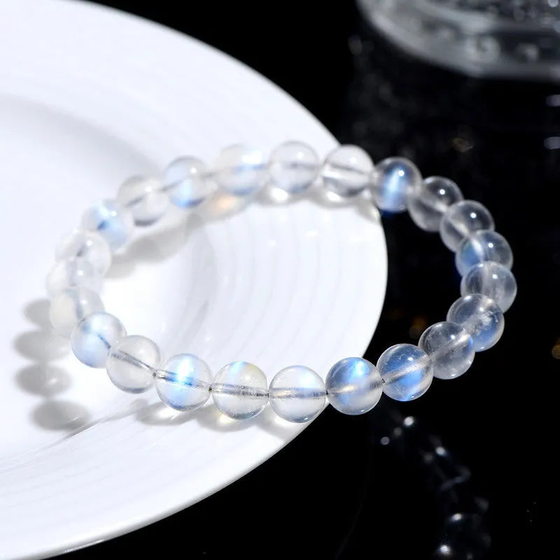 Natural cream body blue moonlight crystal bracelet with smooth ground beads in unisex simple design