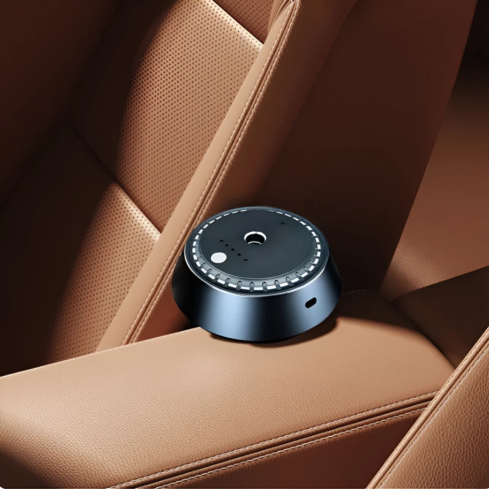 Black metal smart car aroma diffuser with USB cable, showing compact 9cm by 4.5cm size.