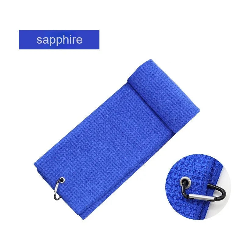 Waffle-textured golf ball cleaning cloth showing weave pattern in blue colour